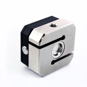 Cartesy SensoLink reference sensor with compact, square metal design, side button, and threaded opening at the top.