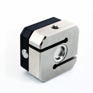 Cartesy SensoLink Referenzsensor mit kompakter, eckiger Bauform aus Metall, seitlicher Taste und Gewindeöffnung oben